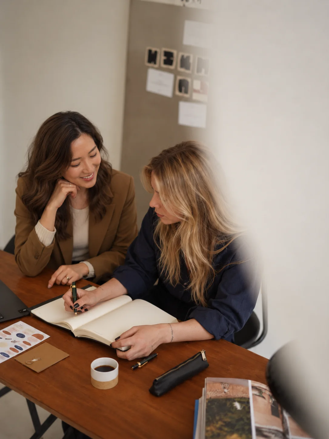 A team collaborating in a warm, creative workspace
